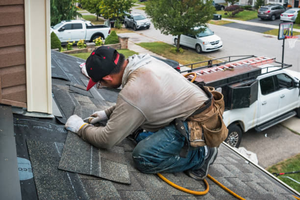 Professional Emergency Roof Repair technician working in Wampsville, NY